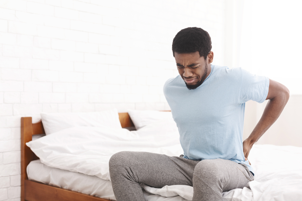 back hurts when i lay down